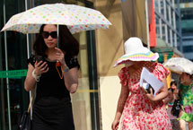 北京发布今夏首个高温预警 明后天最高温达36度