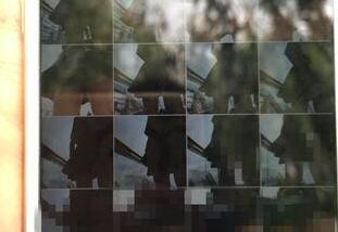 姑娘逛街遭偷拍裙底 变态男存2000多张照片