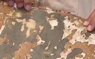 疑似MH370残骸现烧焦痕迹 或首次证明机上曾着火