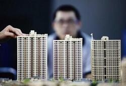 “紧”调控稳住房价 楼市期盼长效机制