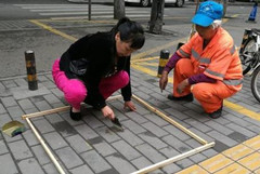 西安道路保洁标准“以克论净”引议 官方称达标不难