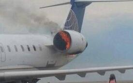 美联航客机着陆后引擎冒火燃烧