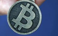 不到一周跌40％ 比特币从网络走进现实道阻且长