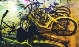 单车坟场成患 “解决痛点”为何成了痛点