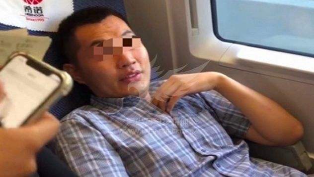 该不该“人肉”高铁霸座男？港媒:耍无赖法律处罚