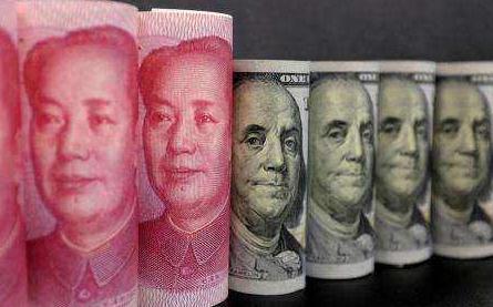 人民币对美元收盘价跌破6.95 创近十年半新低