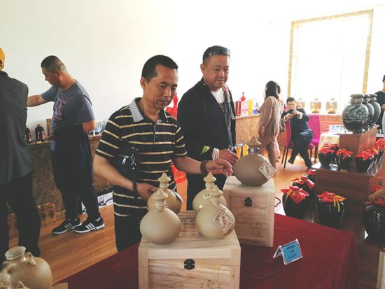 酒香引客来  携手商共建