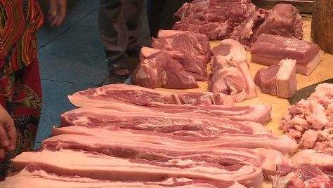 商务部会同相关部门向市场投放中央储备猪肉10000吨