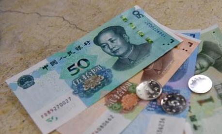 人民币图样使用管理办法施行：对人民币不能拒用乱用