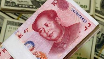 人民币兑美元中间价破七 下调392个基点