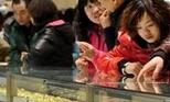 金价破冰猛涨 中国大妈全球金店再扫货