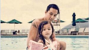 吴彦祖陪女儿看电影 小美女梳丸子头可爱