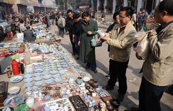 市场成交平缓，100克金猫成热点