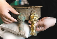 乒乓球冠军变文物修复能手 还青铜器千年原貌