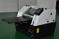 出租屋内造假名牌打印机在网店销售